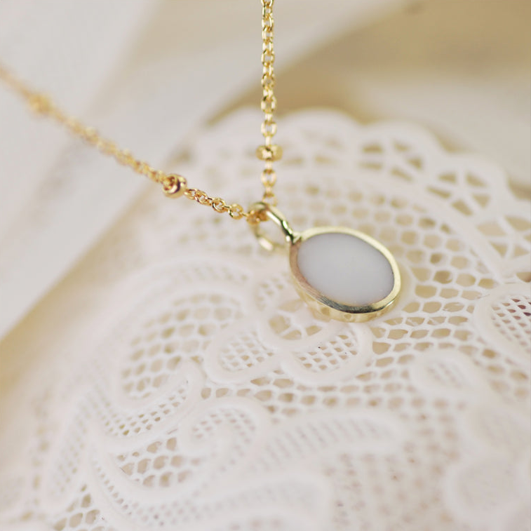 Moedermelk sieraden 9K